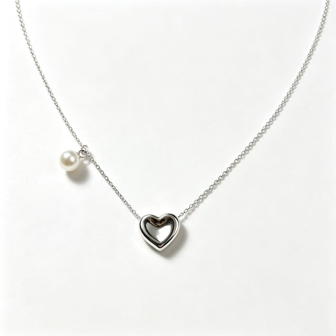 Collar de perlas en forma de corazón
