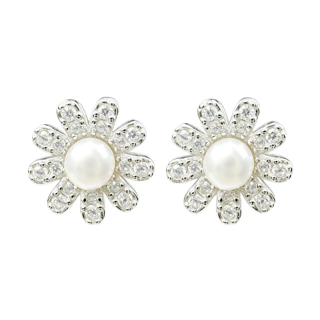 Pendientes adornados con margaritas
