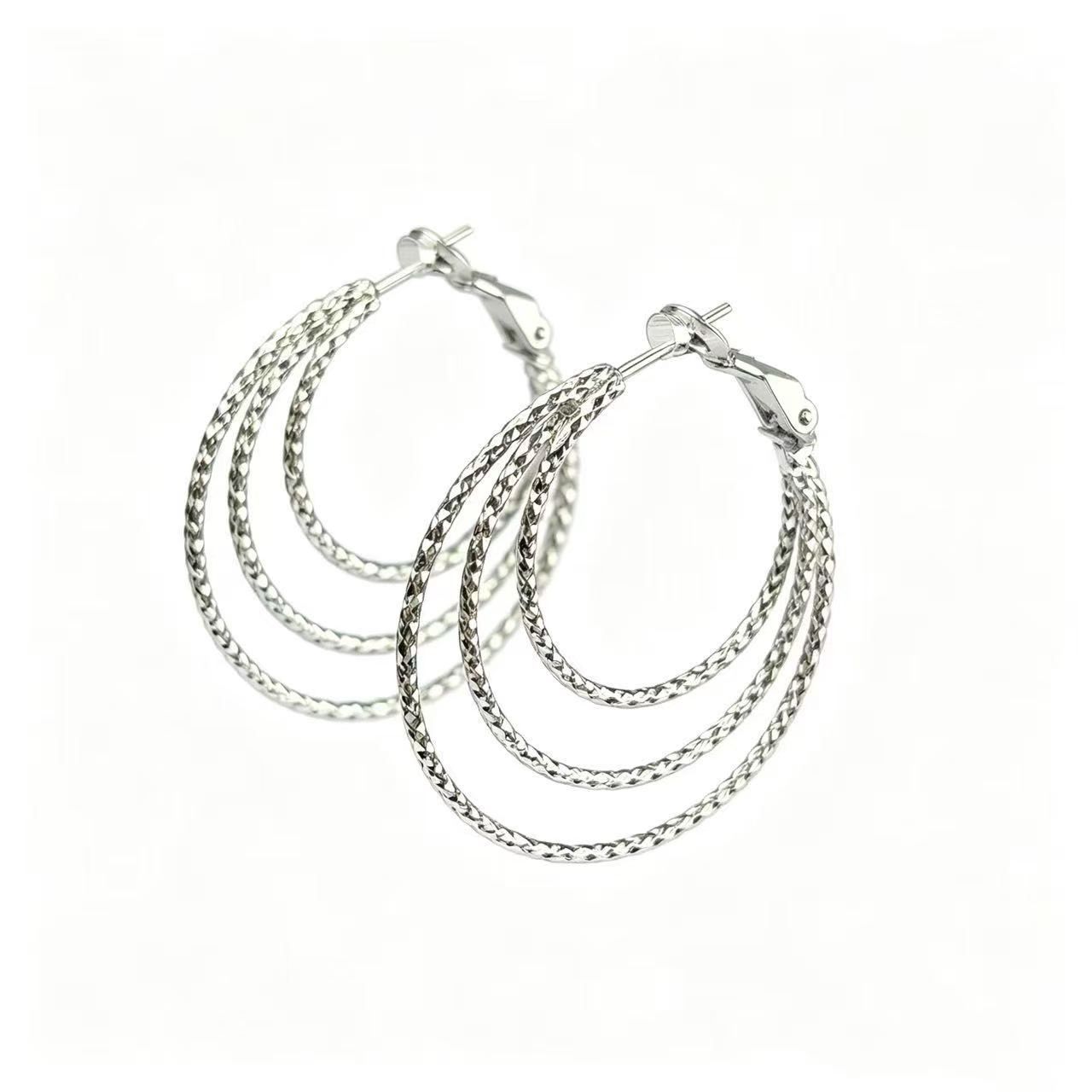 Vintage-style three-tier earrings