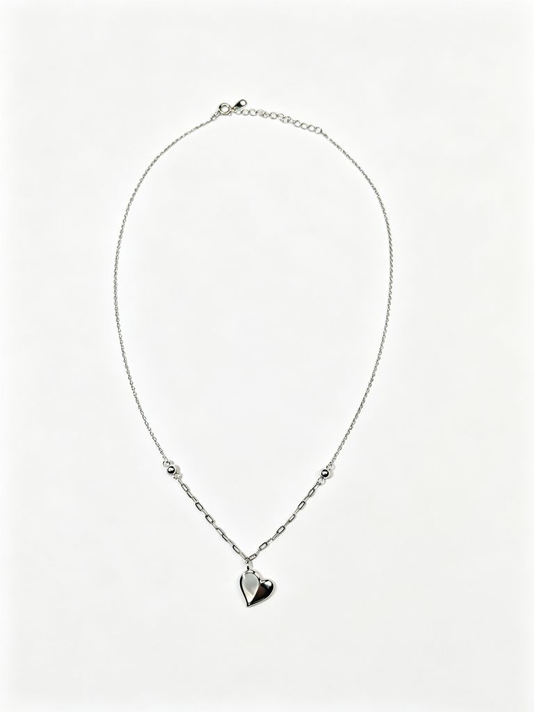 Collar de plata en forma de corazón y dos tonos 3